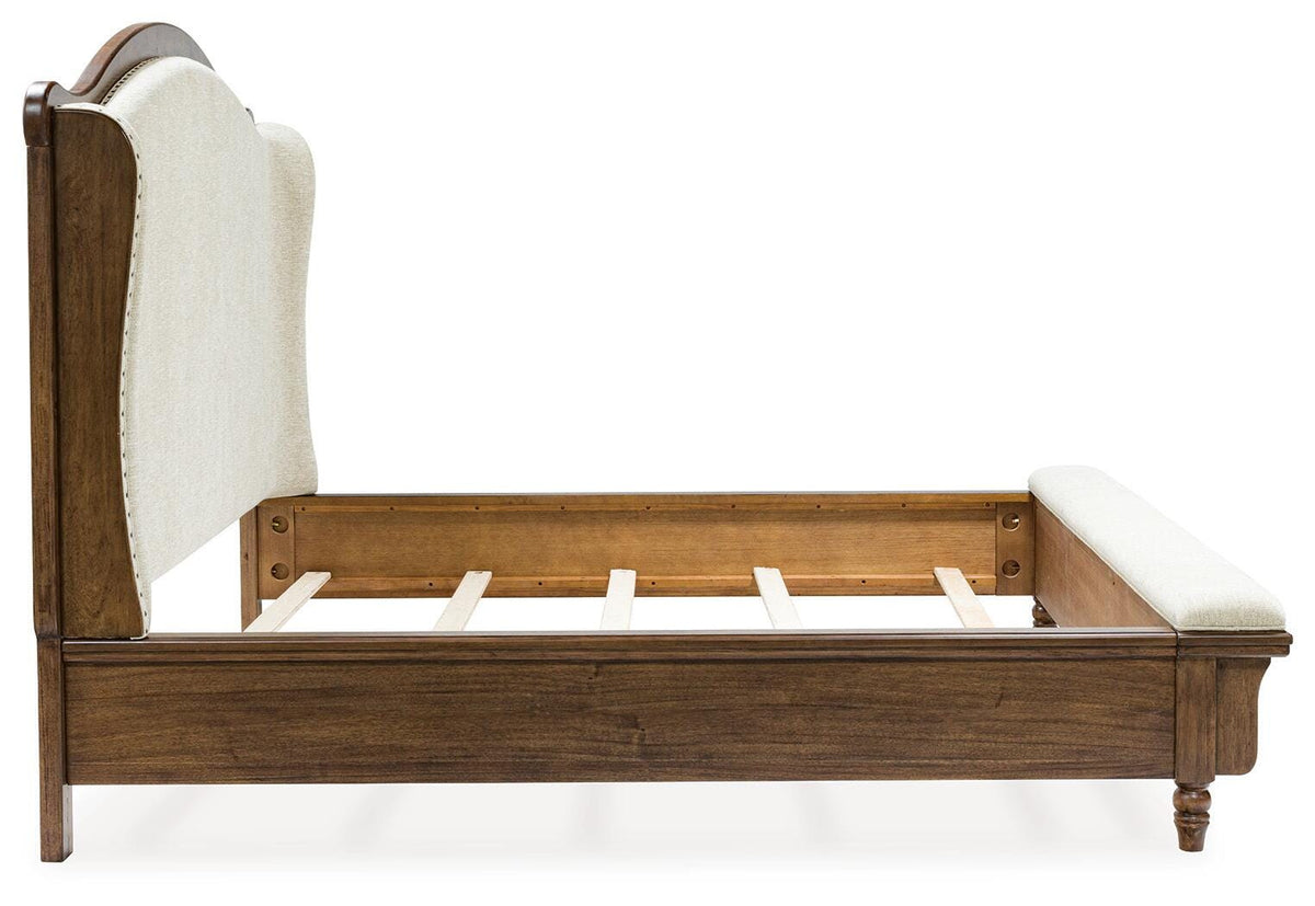 Sturlayne Queen Upholstered Panel Bed in Brown, side view