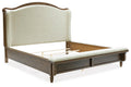 Sturlayne King Upholstered Panel Bed in Brown, angle view
