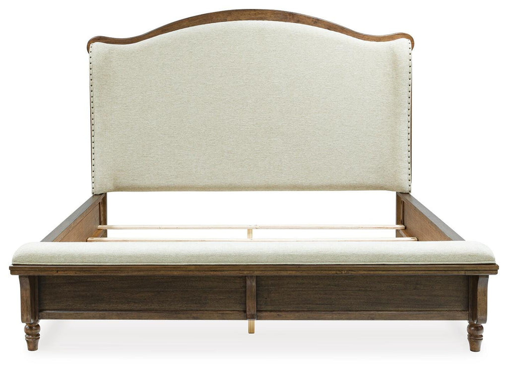 Sturlayne King Upholstered Panel Bed in Brown, front view