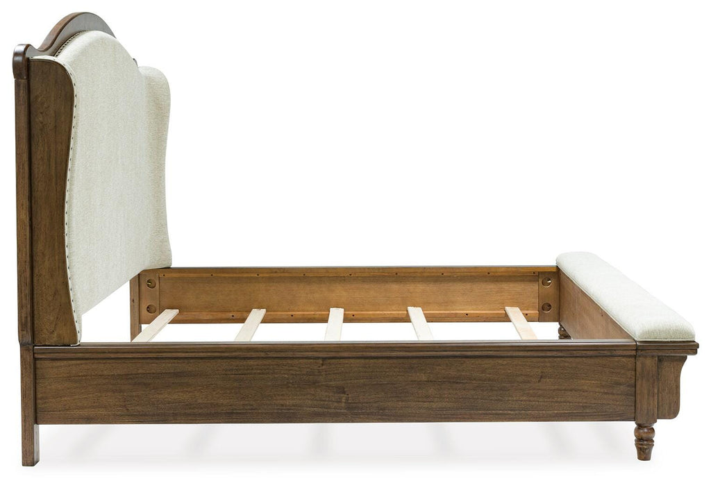 Sturlayne King Upholstered Panel Bed in Brown, side view
