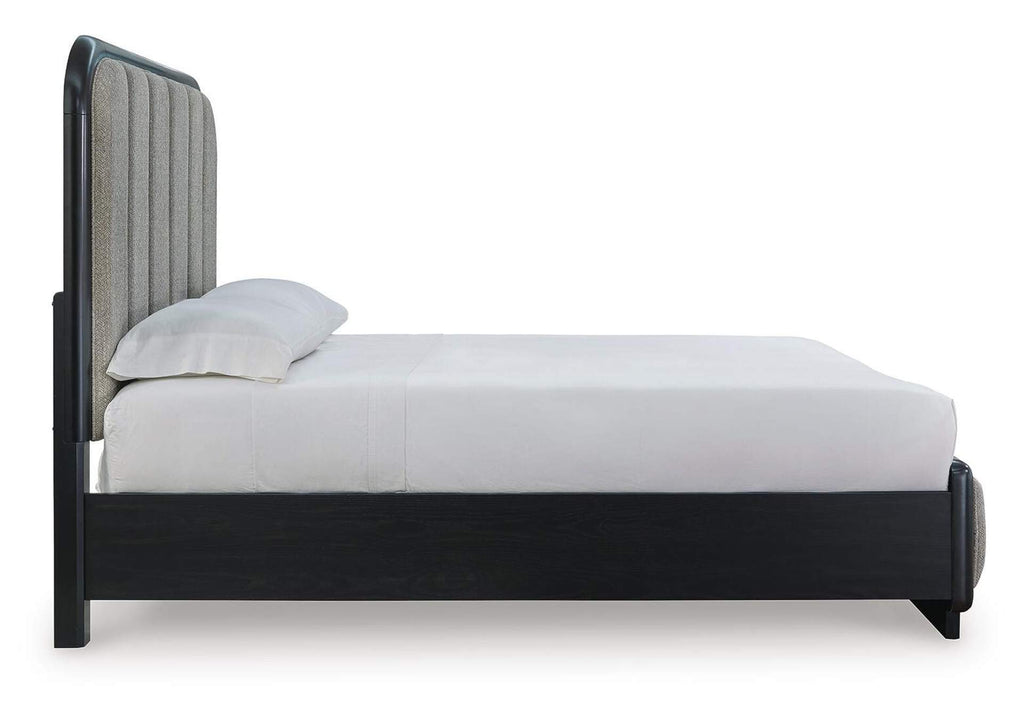 Rowanbeck Queen Upholstered Panel Bed, Dresser, Mirror and Nightstand side view