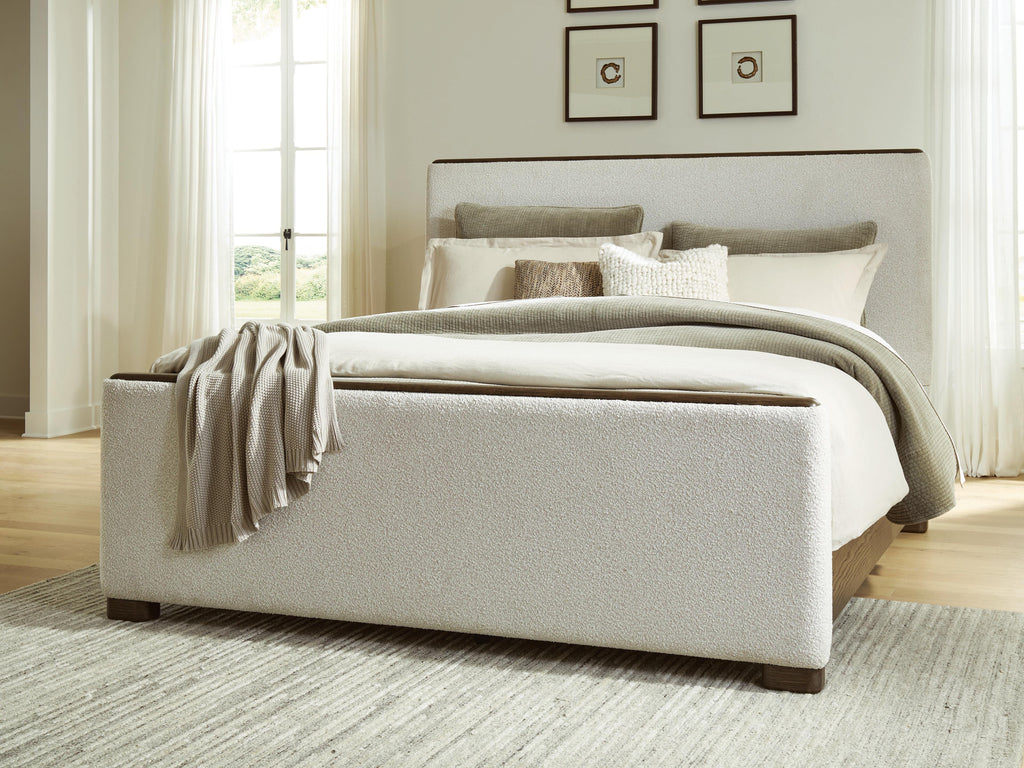 Radkin Queen Upholstered Panel Bed in Burnished Brown, lifestyle view