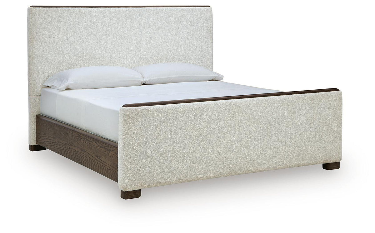 Radkin King Upholstered Panel Bed in Burnished Brown, angle view