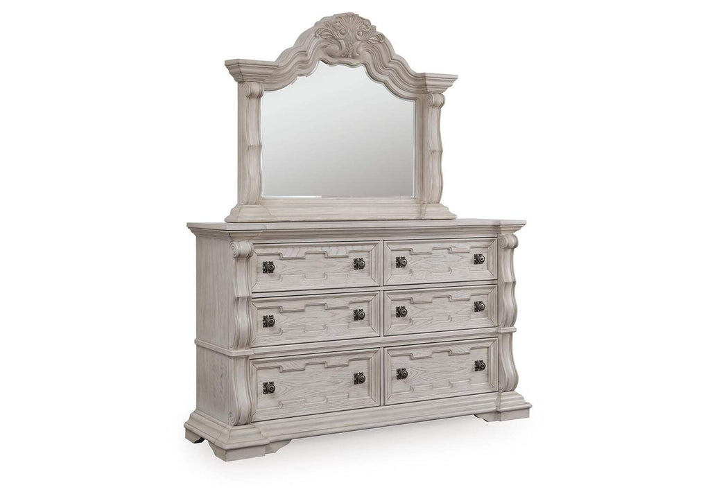 Andonhall King Upholstered Panel Bed with Mirrored Dresser and Nightstand angled view