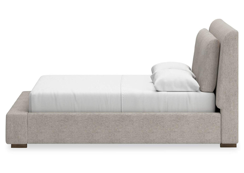 Cabalynn Queen Upholstered Bed with Mirrored Dresser and 2 Nightstands side view