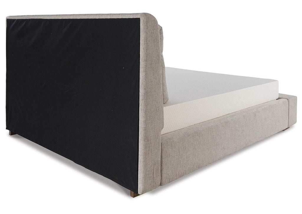 Cabalynn King Upholstered Bed with Chest and Nightstand angled view