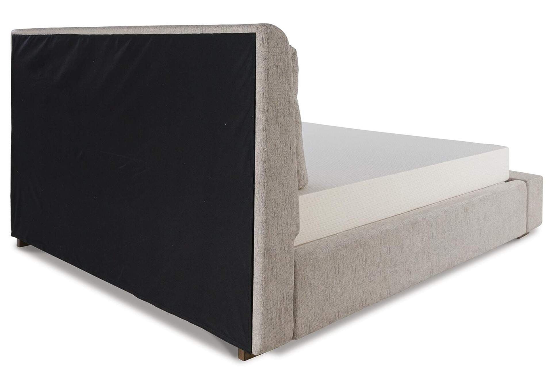 Cabalynn King Upholstered Bed with Chest and Nightstand angled view