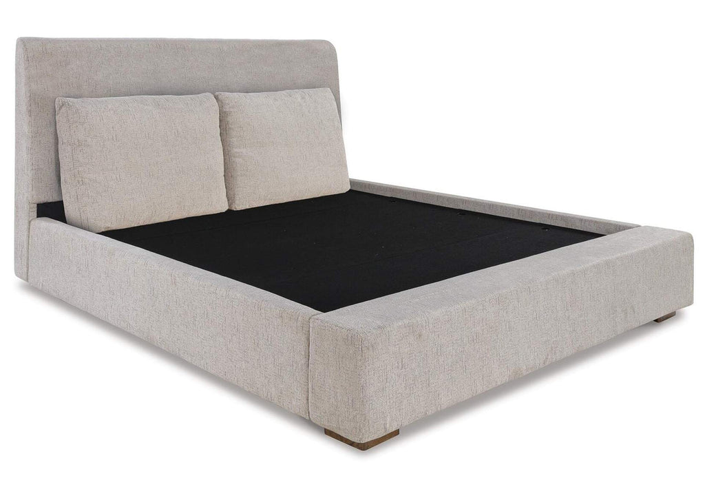 Cabalynn King Upholstered Bed with Chest and Nightstand angled view