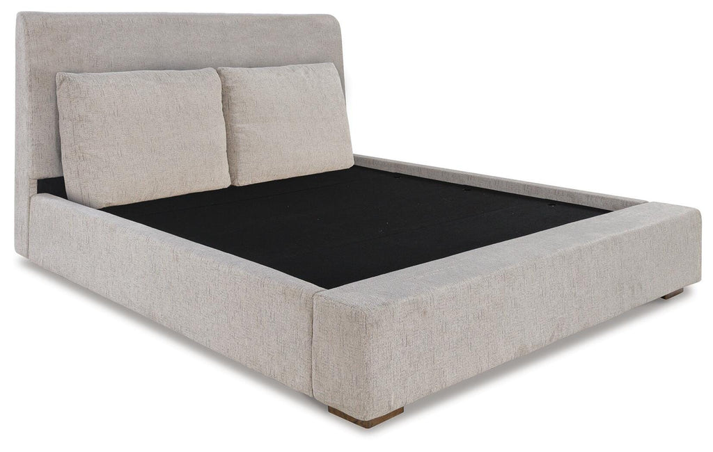 Cabalynn California King Upholstered Bed in Light Brown, angle view