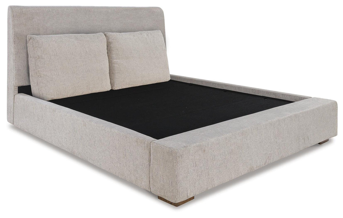 Cabalynn California King Upholstered Bed in Light Brown, angle view