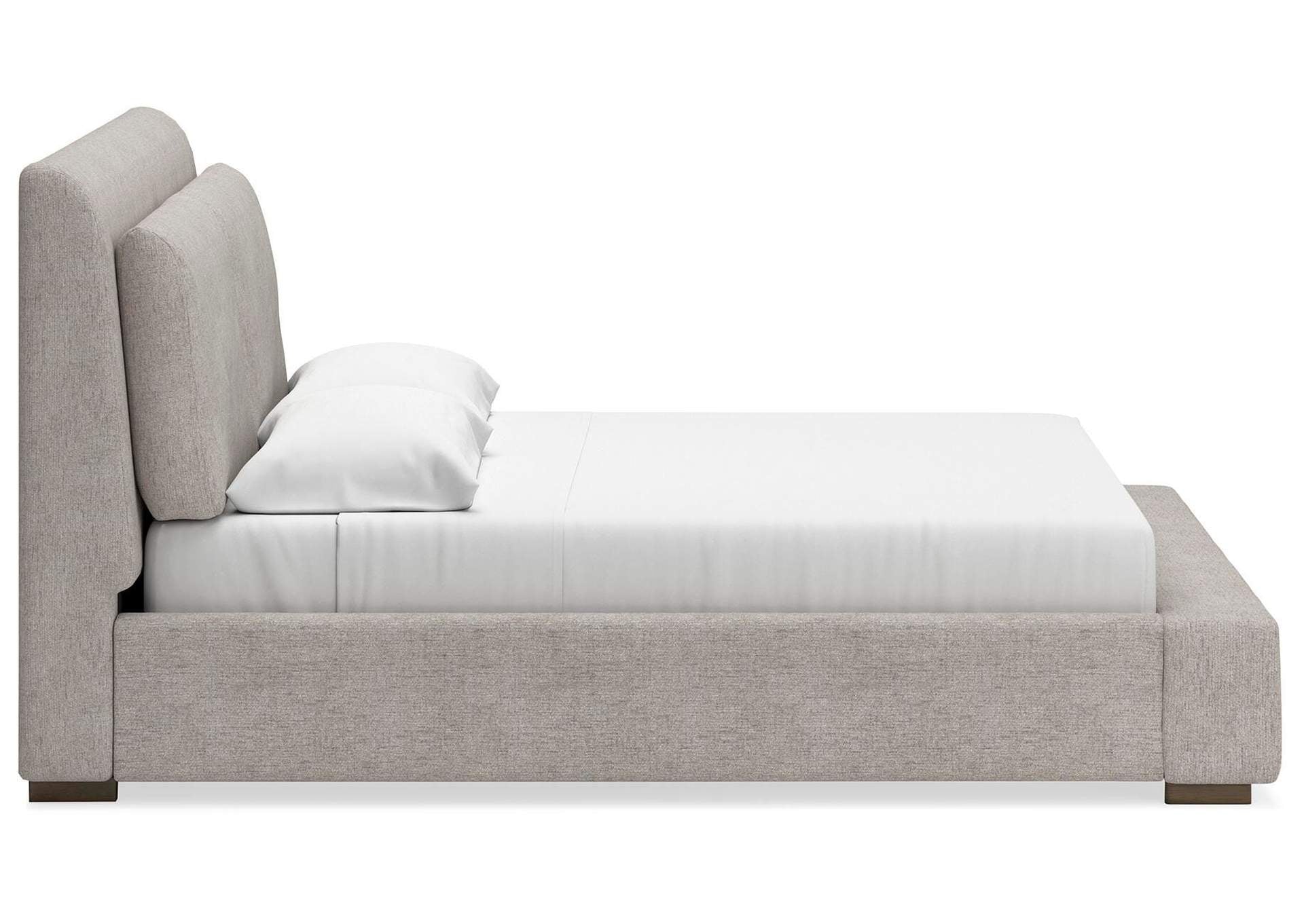 Cabalynn King Upholstered Bed with Chest and Nightstand side view