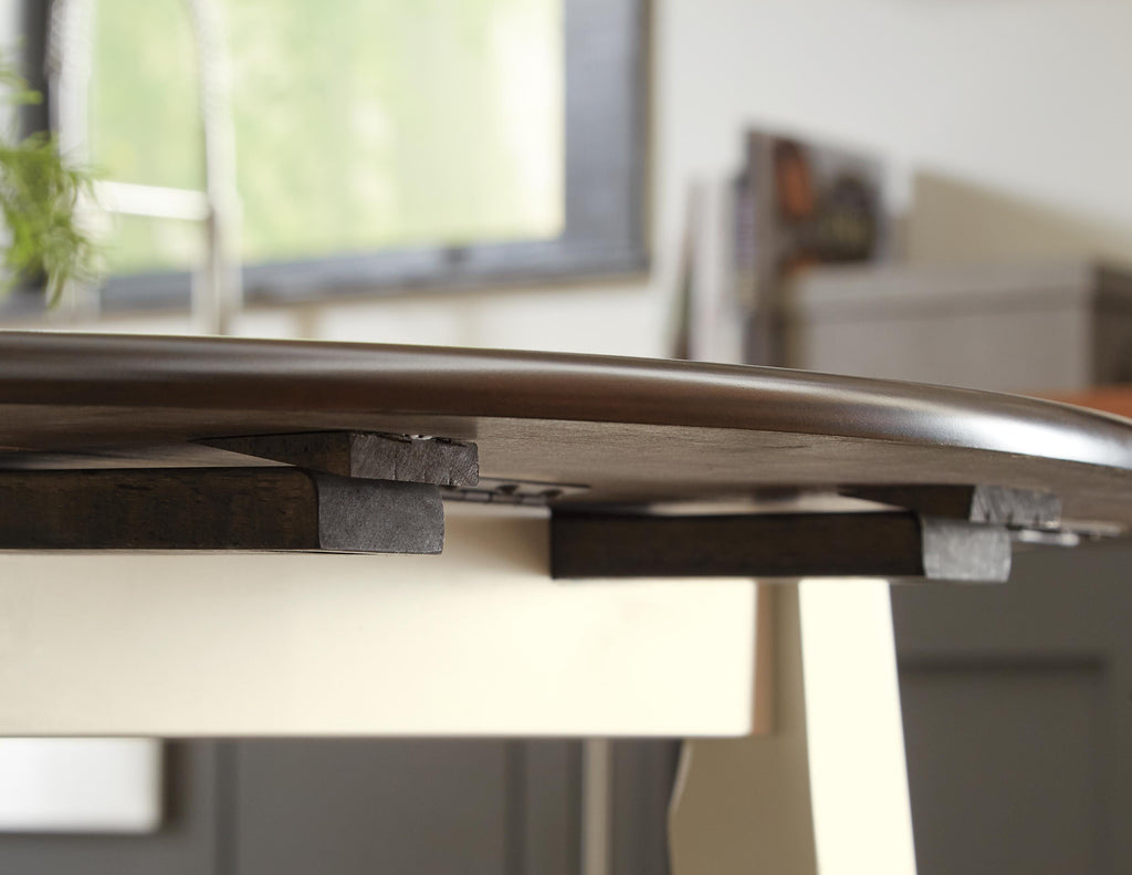 Woodanville Dining Drop Leaf Table in Cream/Brown, detail view