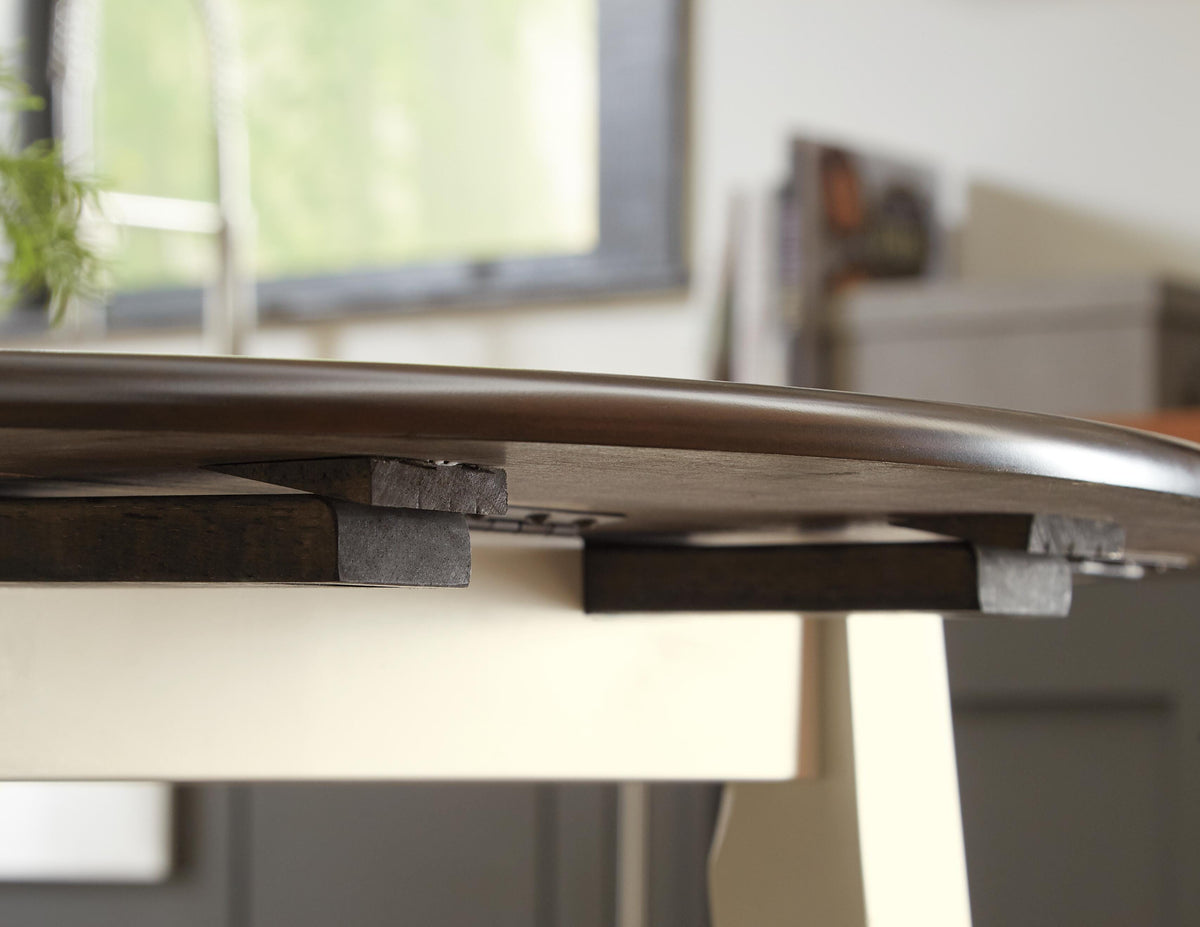 Woodanville Dining Drop Leaf Table in Cream/Brown, detail view