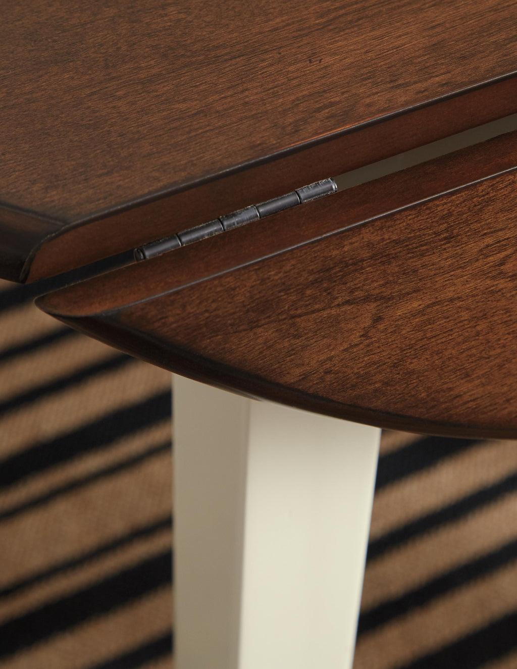 Woodanville Dining Drop Leaf Table in Cream/Brown, detail view