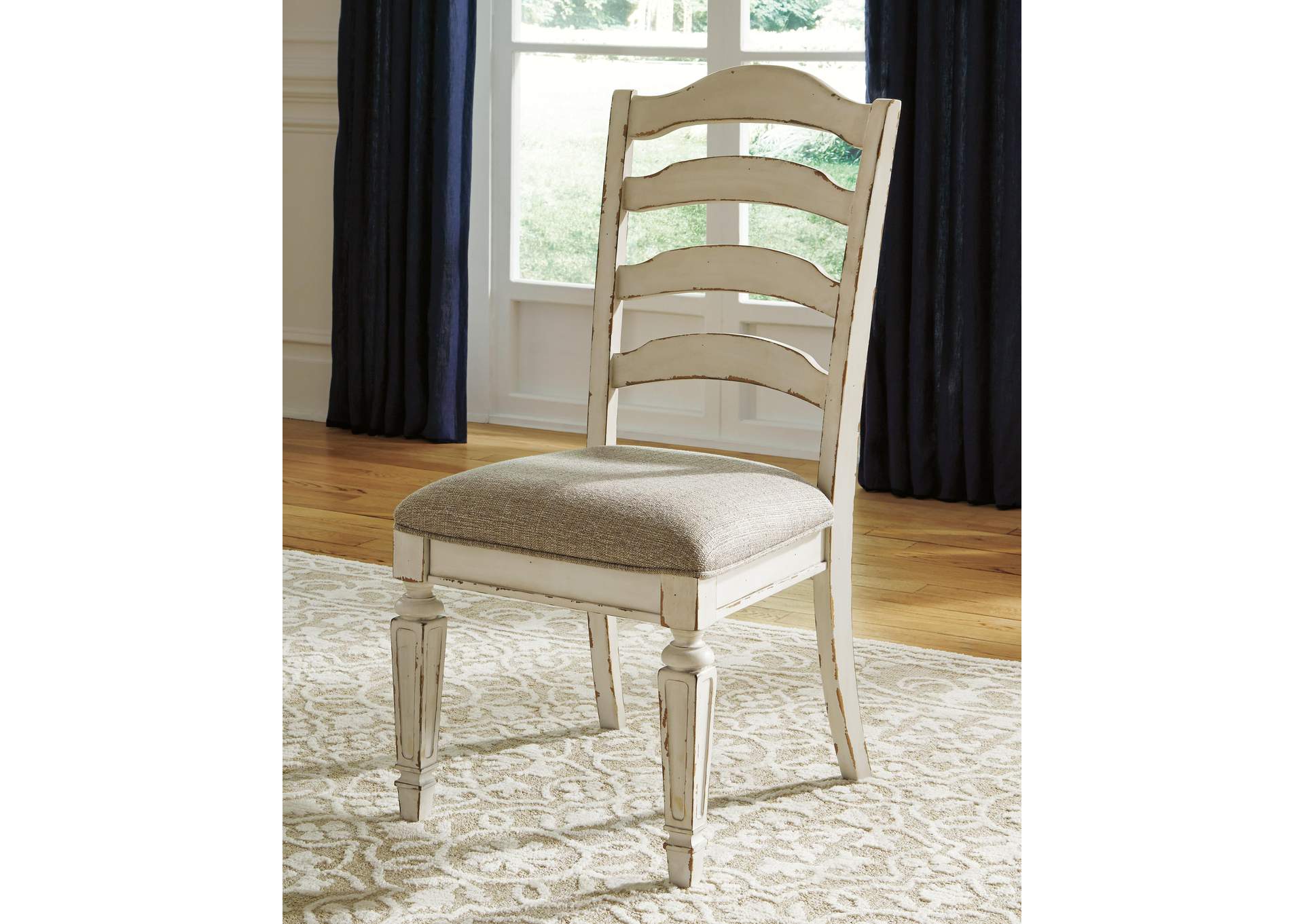 Realyn Oval Extendable Dining Table and 4 Chairs room view