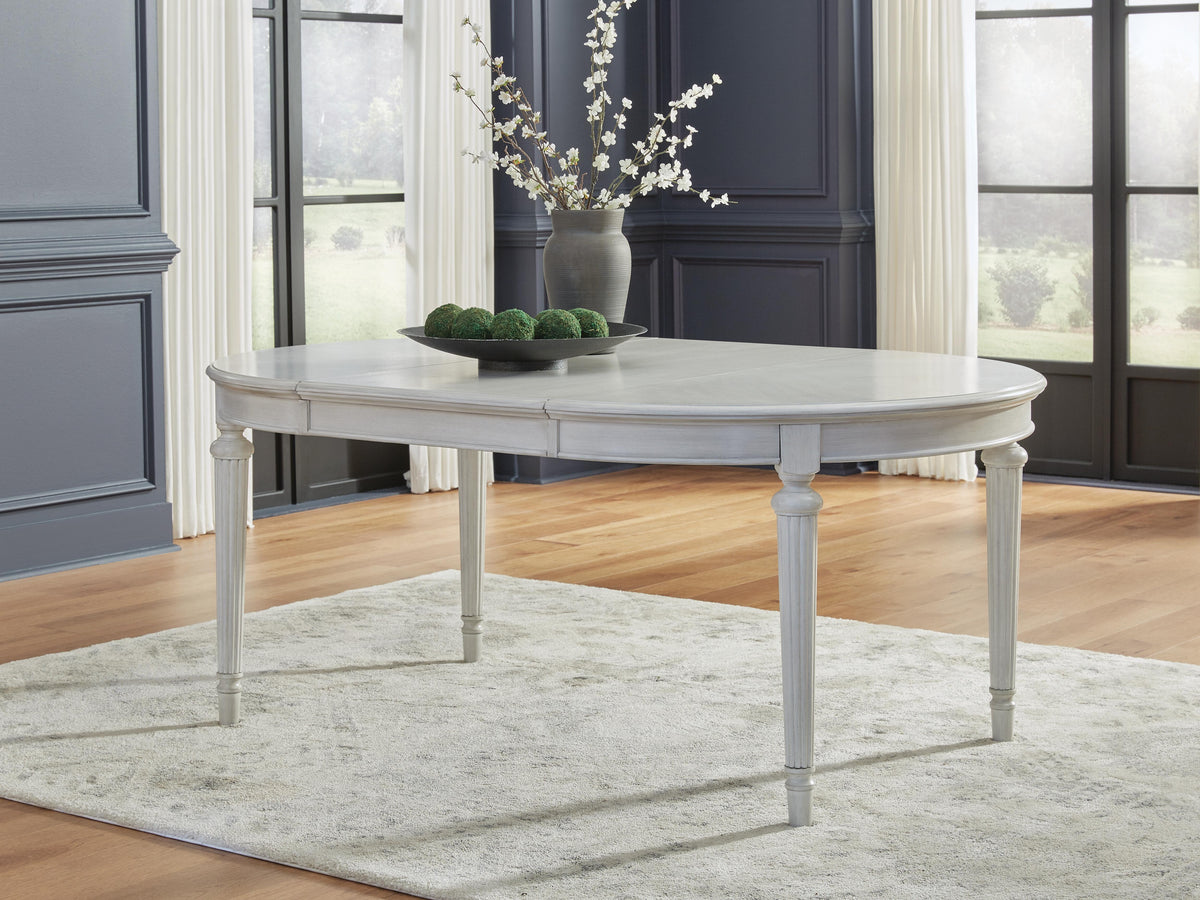 Montelaine Dining Extension Table in Antique White, lifestyle view