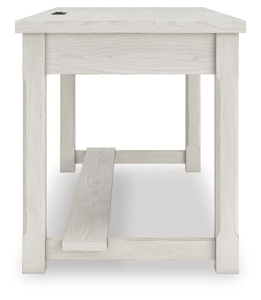 Robbinsdale Home Office Desk in Antique White, side view