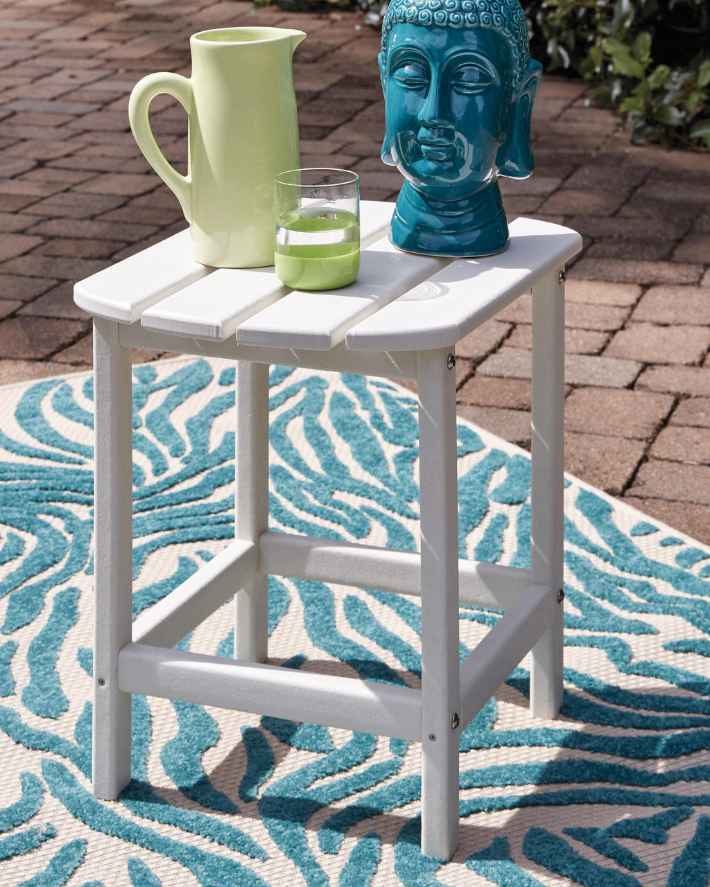 Sundown Treasure End Table in White, lifestyle view