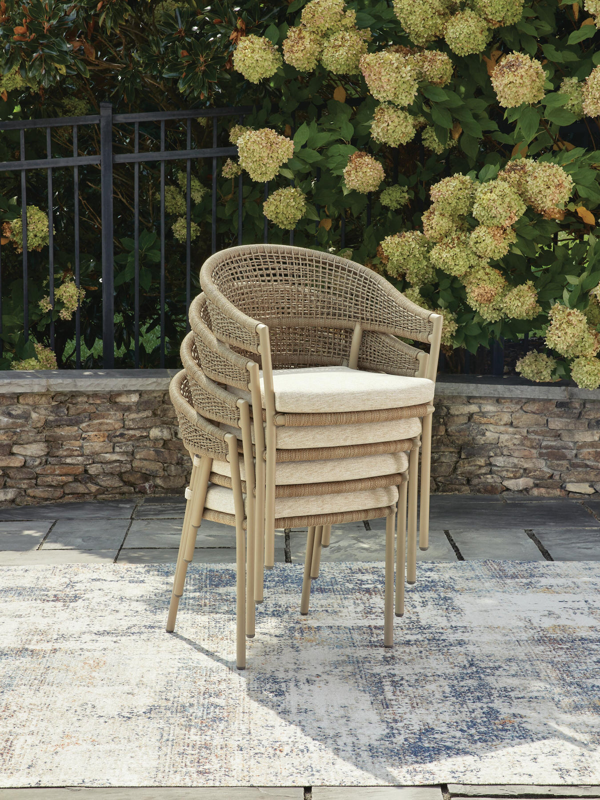 Orchard Beach Outdoor Arm Chair with Cushion (Set of 4) in Beige, lifestyle view