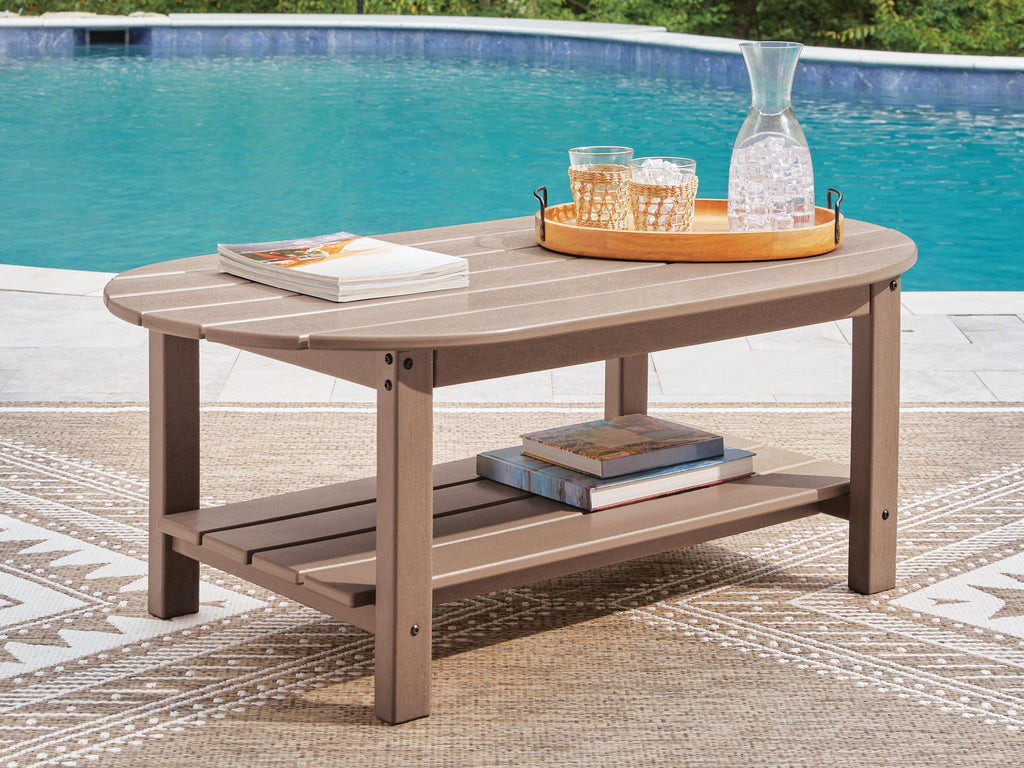 Grover Beach Outdoor Coffee Table in Driftwood, lifestyle view
