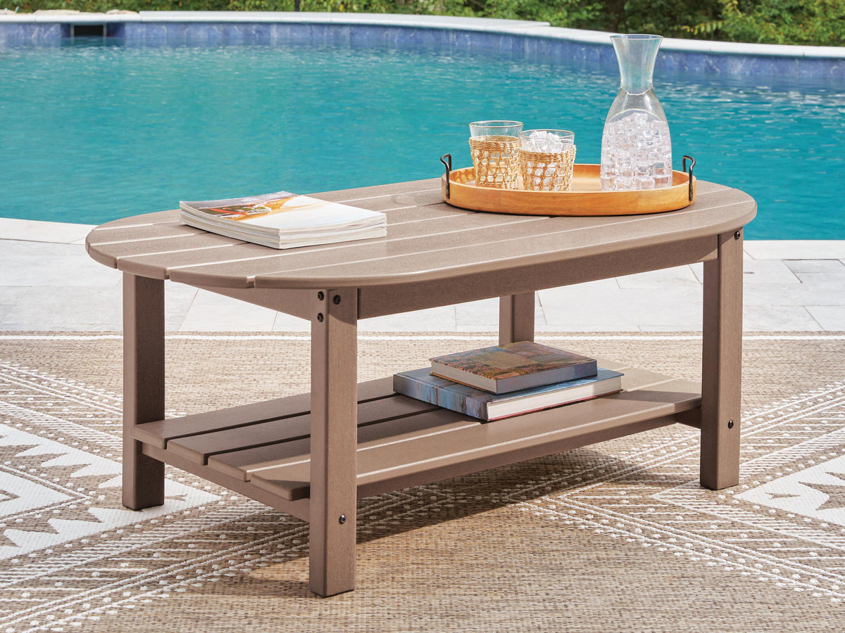 Grover Beach Outdoor Coffee Table in Driftwood, lifestyle view