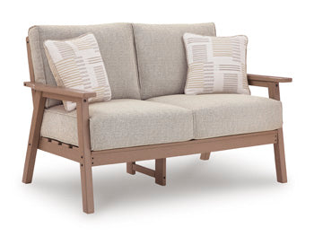 Grover Beach Outdoor Loveseat with Cushion in Driftwood, angle view