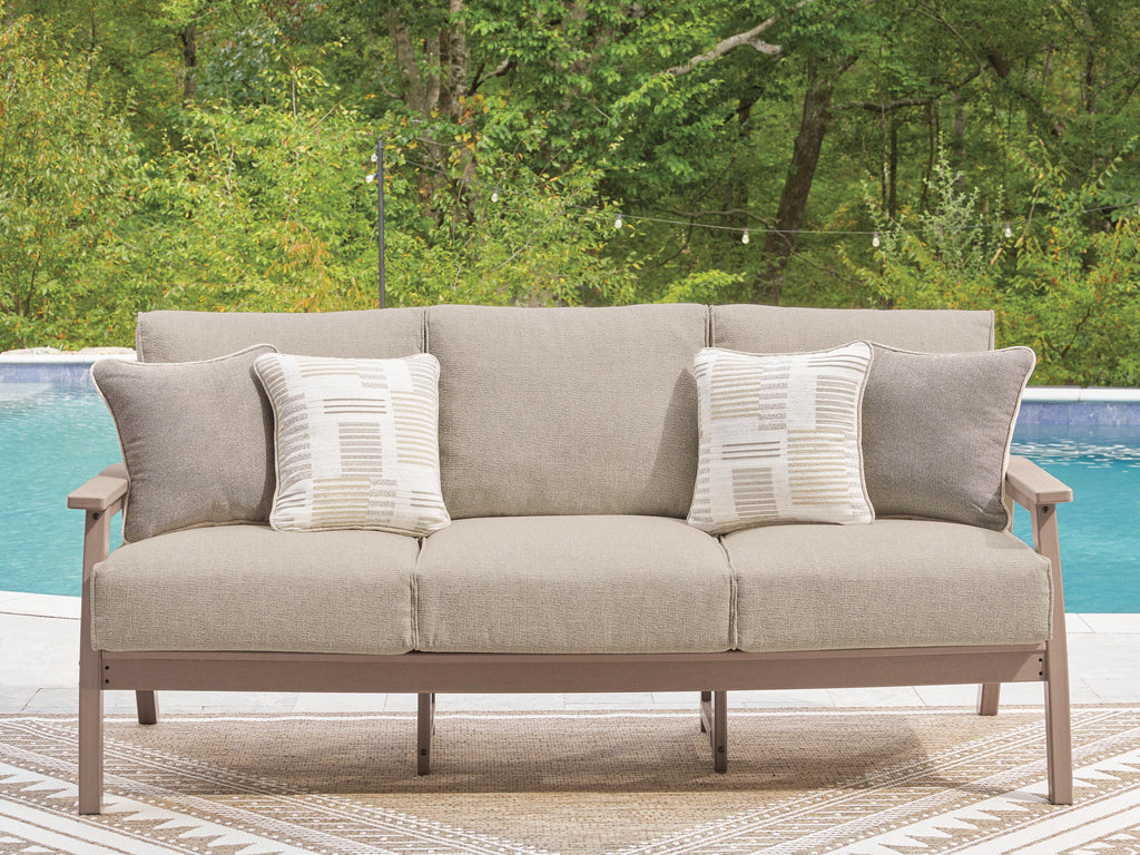 Grover Beach Outdoor Sofa with Cushion in Driftwood, lifestyle view