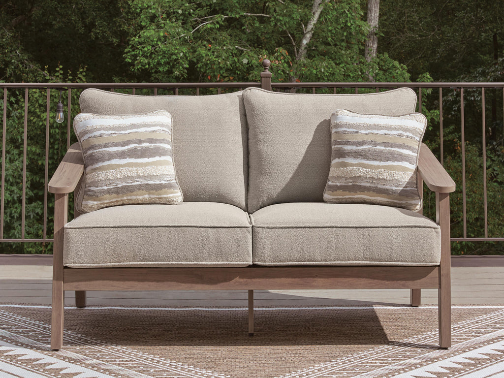 Harmony Headlands Outdoor Loveseat with Cushion in Natural/Gray, lifestyle view