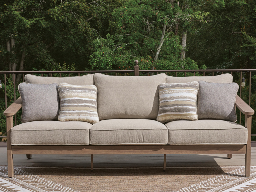 Harmony Headlands Outdoor Sofa with Cushion in Natural/Gray, lifestyle view