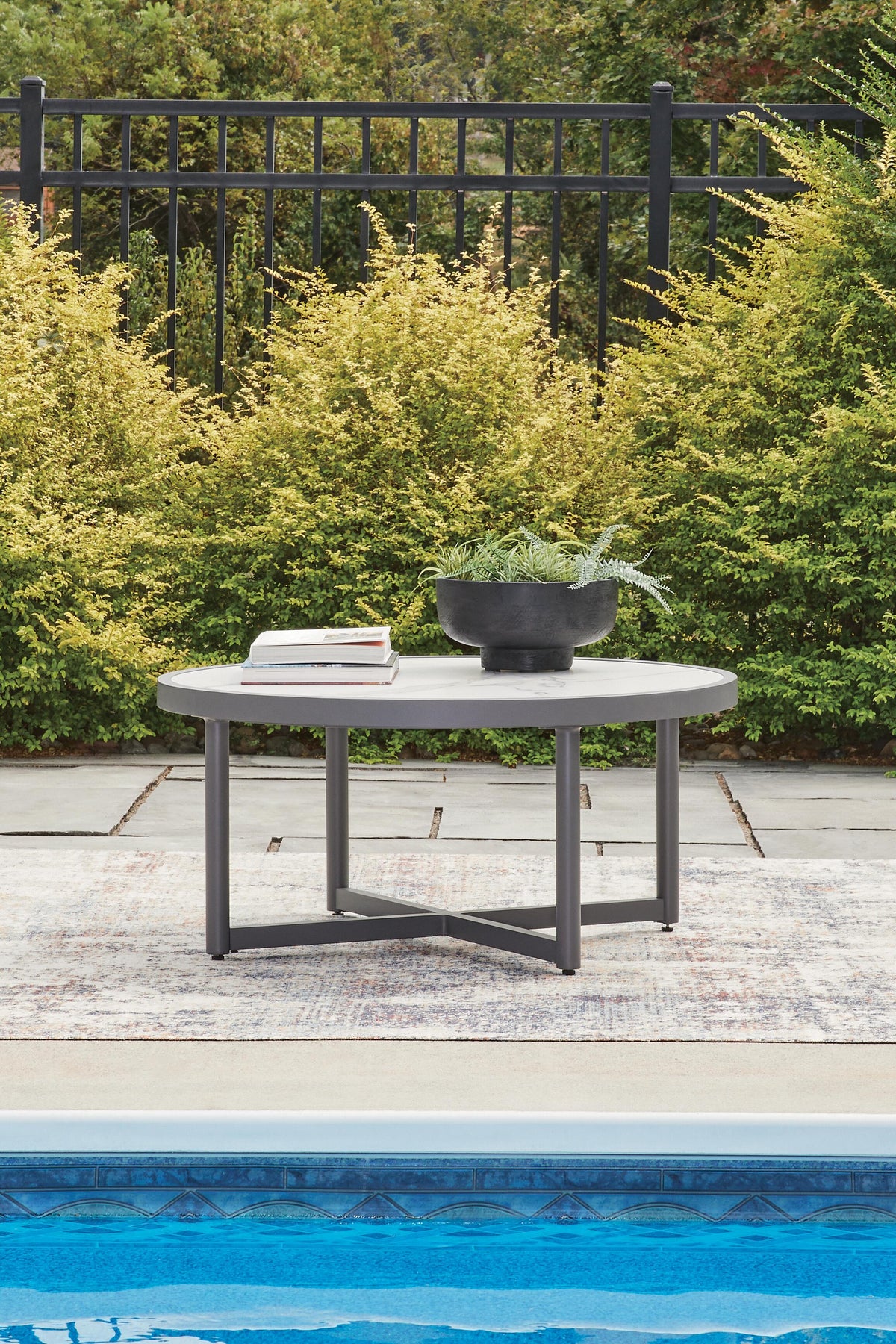 Ocean Beach Outdoor Coffee Table in Gray, lifestyle view