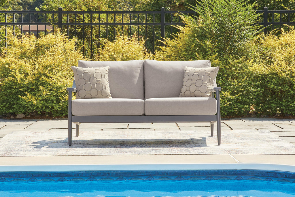 Ocean Beach Outdoor Loveseat with Cushion in Gray, lifestyle view