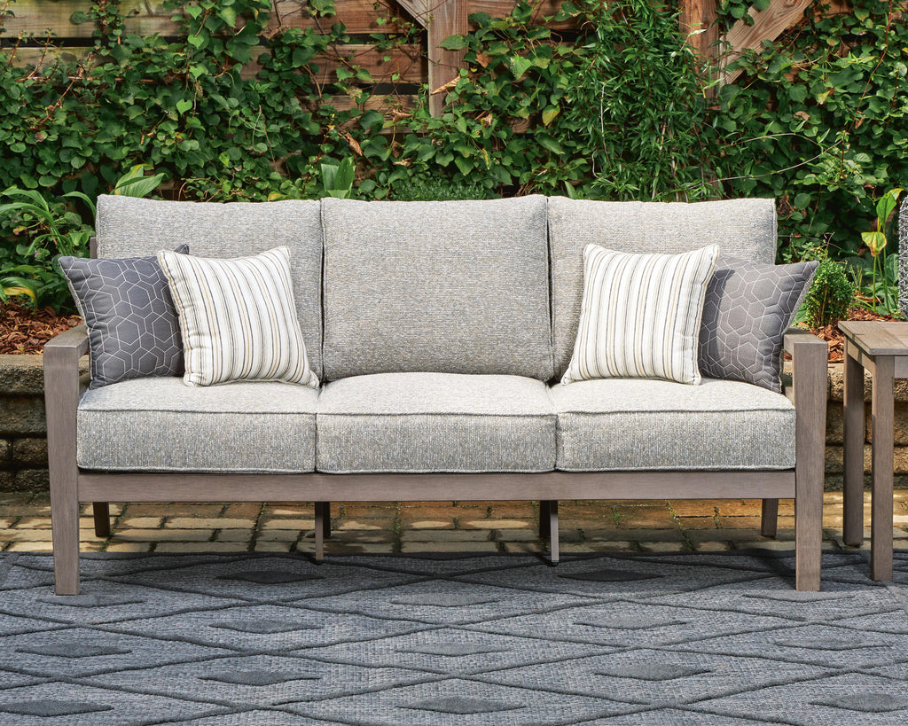 Hillside Barn Outdoor Sofa with Cushion in Gray/Brown, lifestyle view