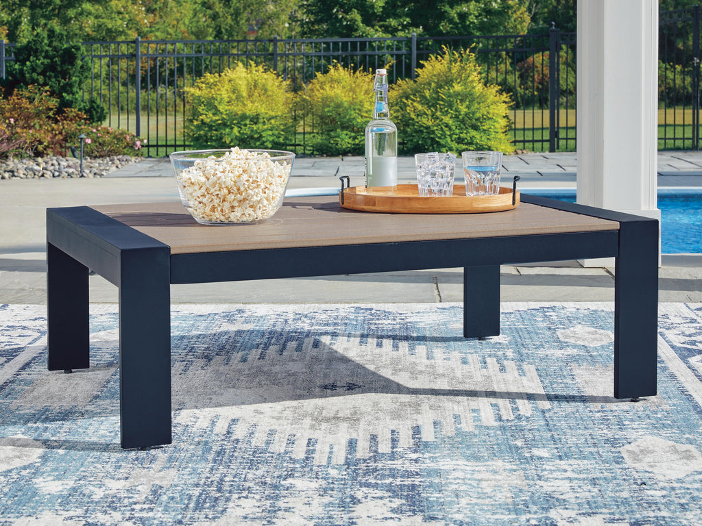 East Beach Outdoor Coffee Table in Navy Blue/Driftwood, lifestyle view
