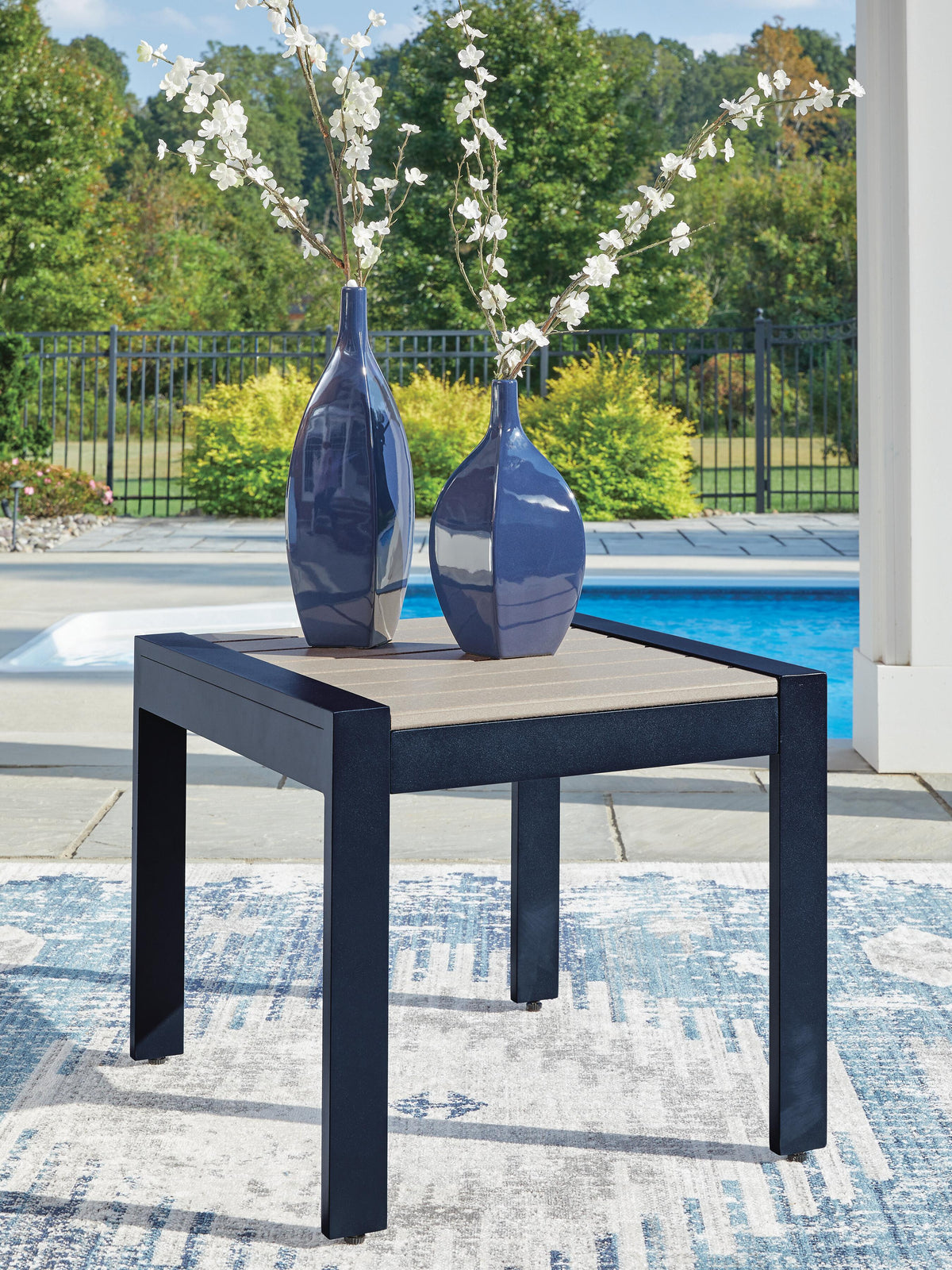 East Beach Outdoor End Table in Navy Blue/Driftwood, lifestyle view
