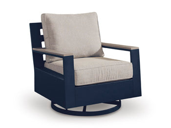East Beach Outdoor Swivel Glider Chair with Cushion in Navy Blue/Driftwood, angle view