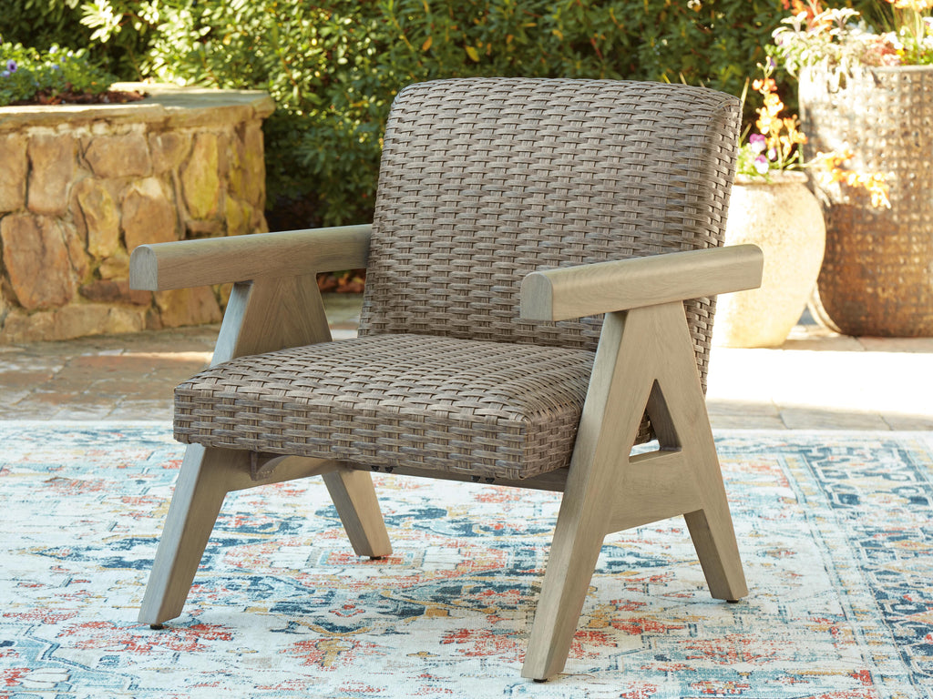 Cliff Trails Outdoor Rocking Lounge Chair in Beige, lifestyle view