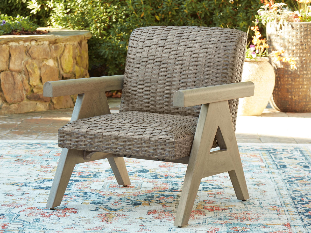 Cliff Trails Outdoor Rocking Lounge Chair in Beige, lifestyle view