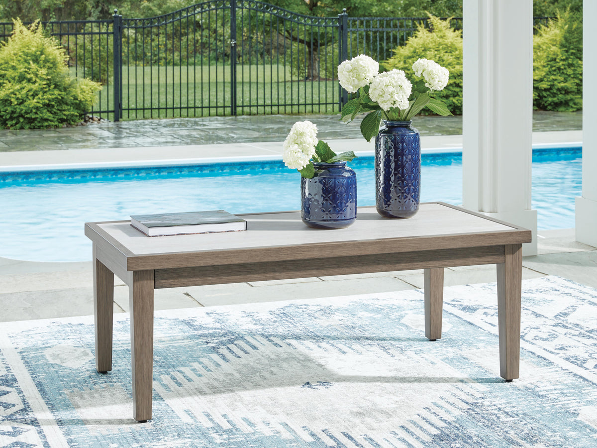 Rainier Ranch Outdoor Coffee Table in Brown/Beige, lifestyle view