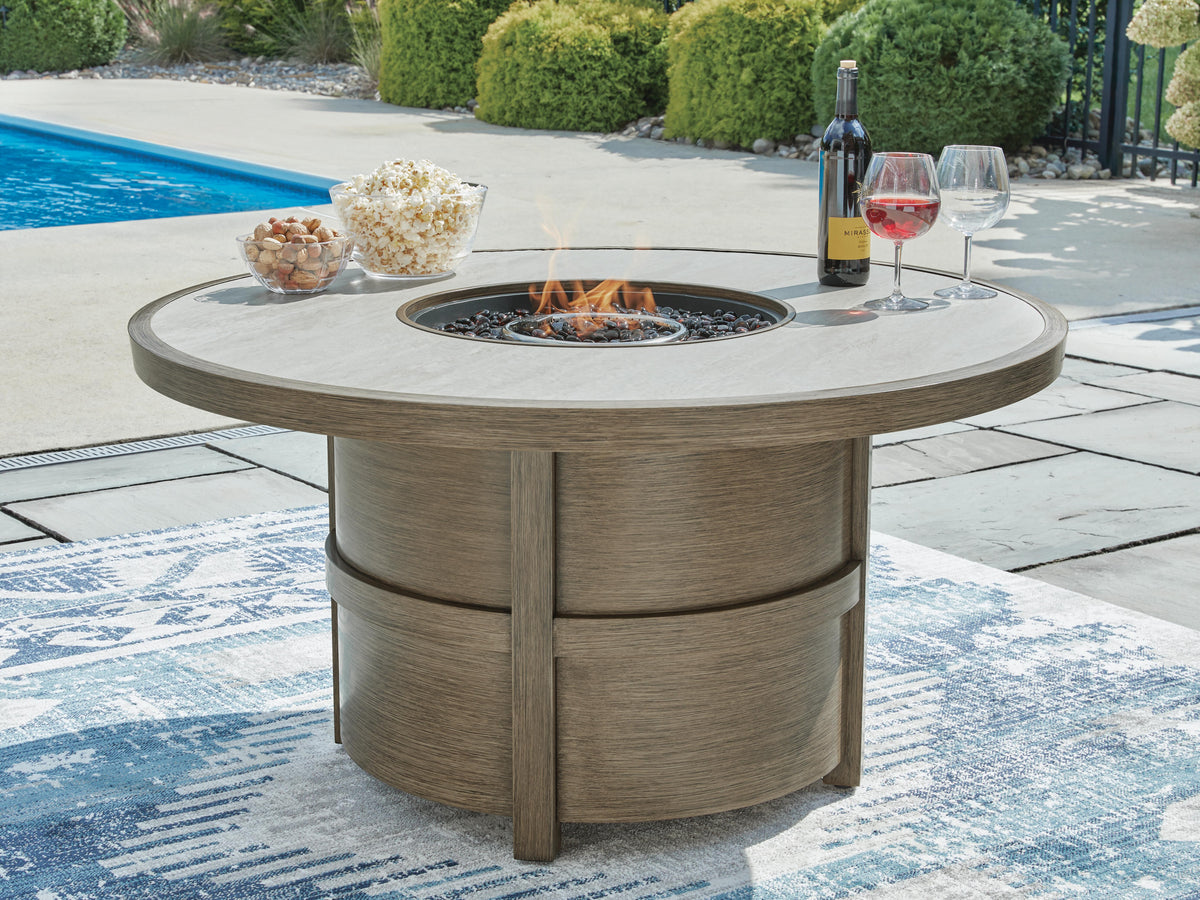 Rainier Ranch Fire Pit Table in Beige, lifestyle view