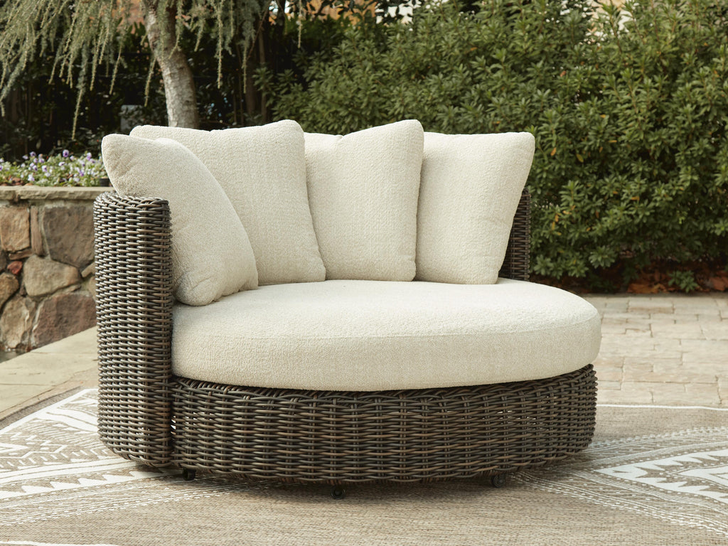 Kimora Outdoor Swivel Lounge Chair with Cushion in Beige/Dark Brown, lifestyle view