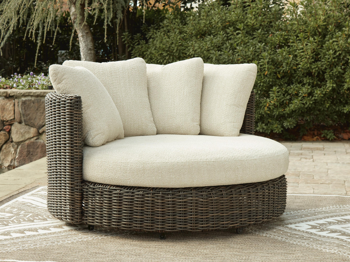 Kimora Outdoor Swivel Lounge Chair with Cushion in Beige/Dark Brown, lifestyle view