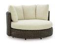 Kimora Outdoor Swivel Lounge Chair with Cushion in Beige/Dark Brown, angle view