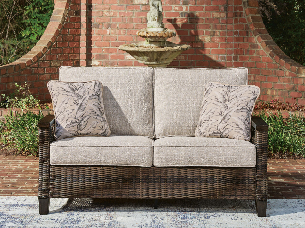 Monterey Point Outdoor Loveseat with Cushion in Dark Brown, lifestyle view