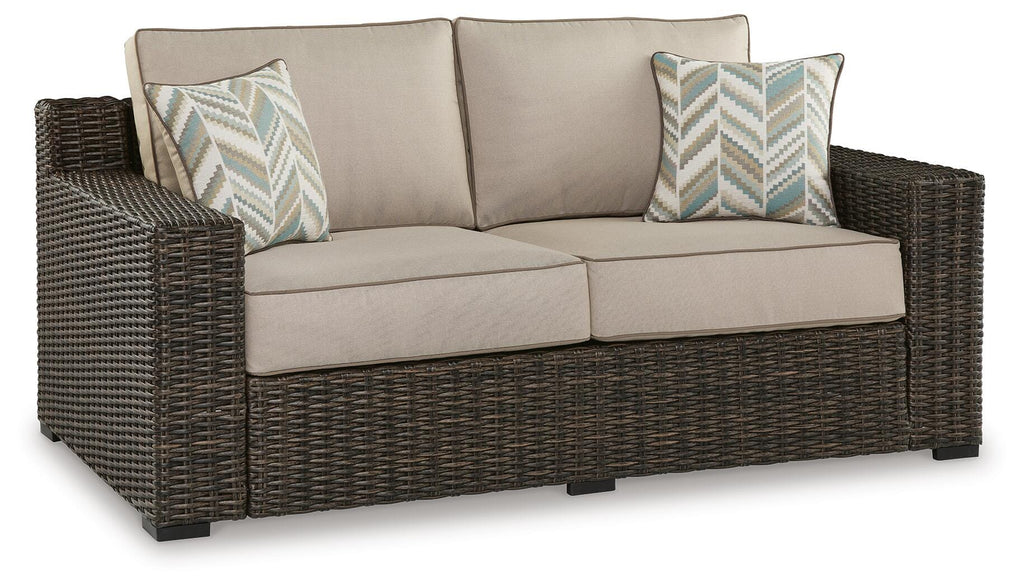 Coastline Bay Outdoor Loveseat with Cushion in Brown, angle view