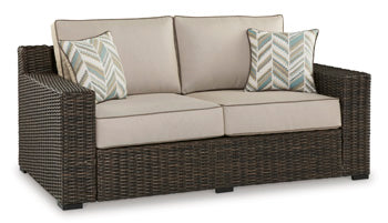 Coastline Bay Outdoor Loveseat with Cushion in Brown, angle view