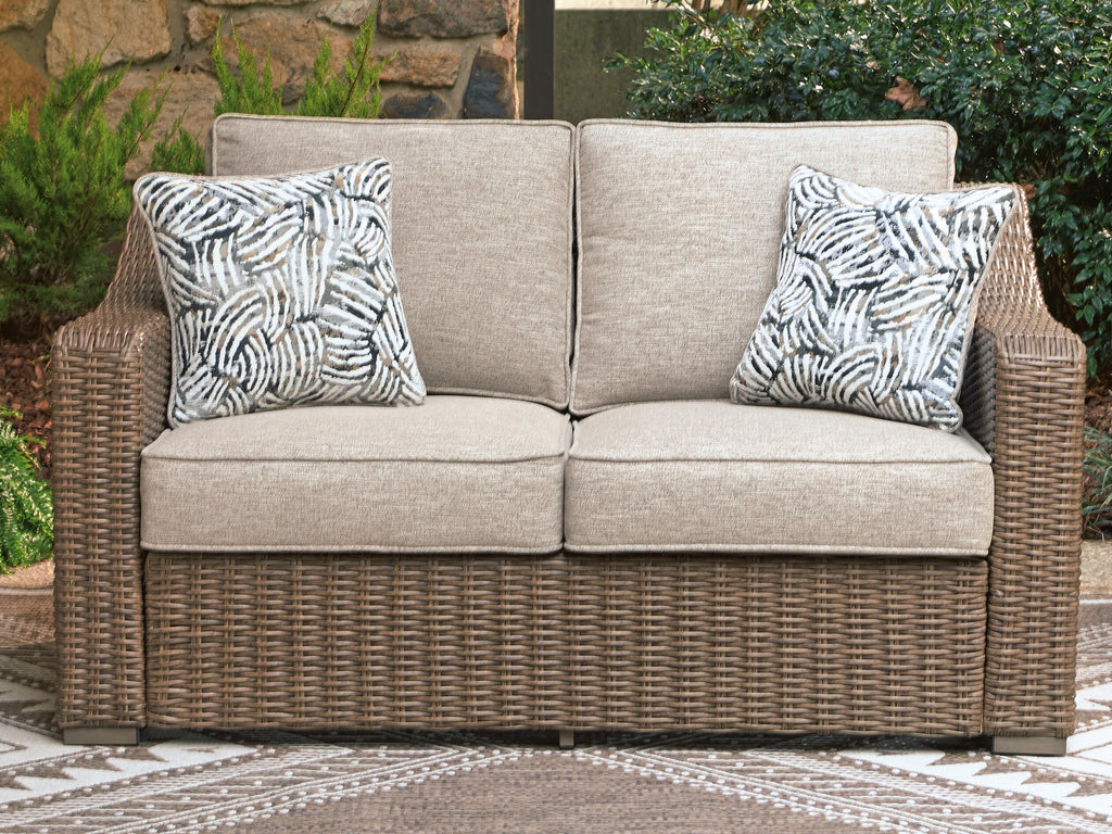 Laguna Heights Outdoor Loveseat with Cushion in Beige, lifestyle view