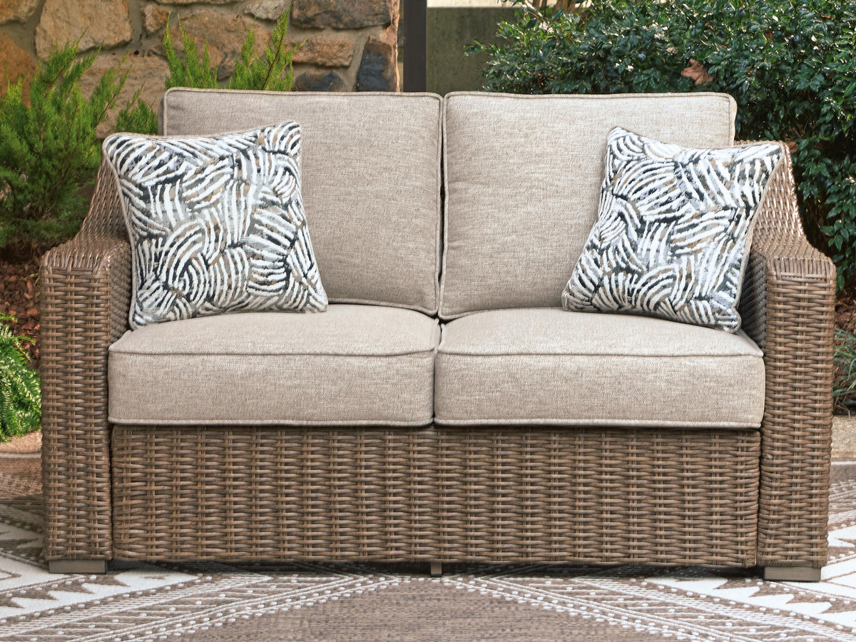 Laguna Heights Outdoor Loveseat with Cushion in Beige, lifestyle view