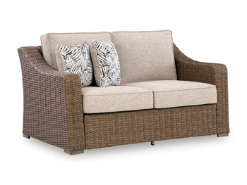 Laguna Heights Outdoor Loveseat with Cushion in Beige, angle view