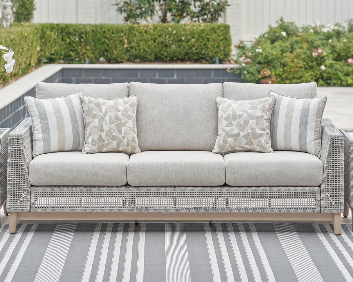 Seton Creek Outdoor Sofa with Cushion in Gray, lifestyle view