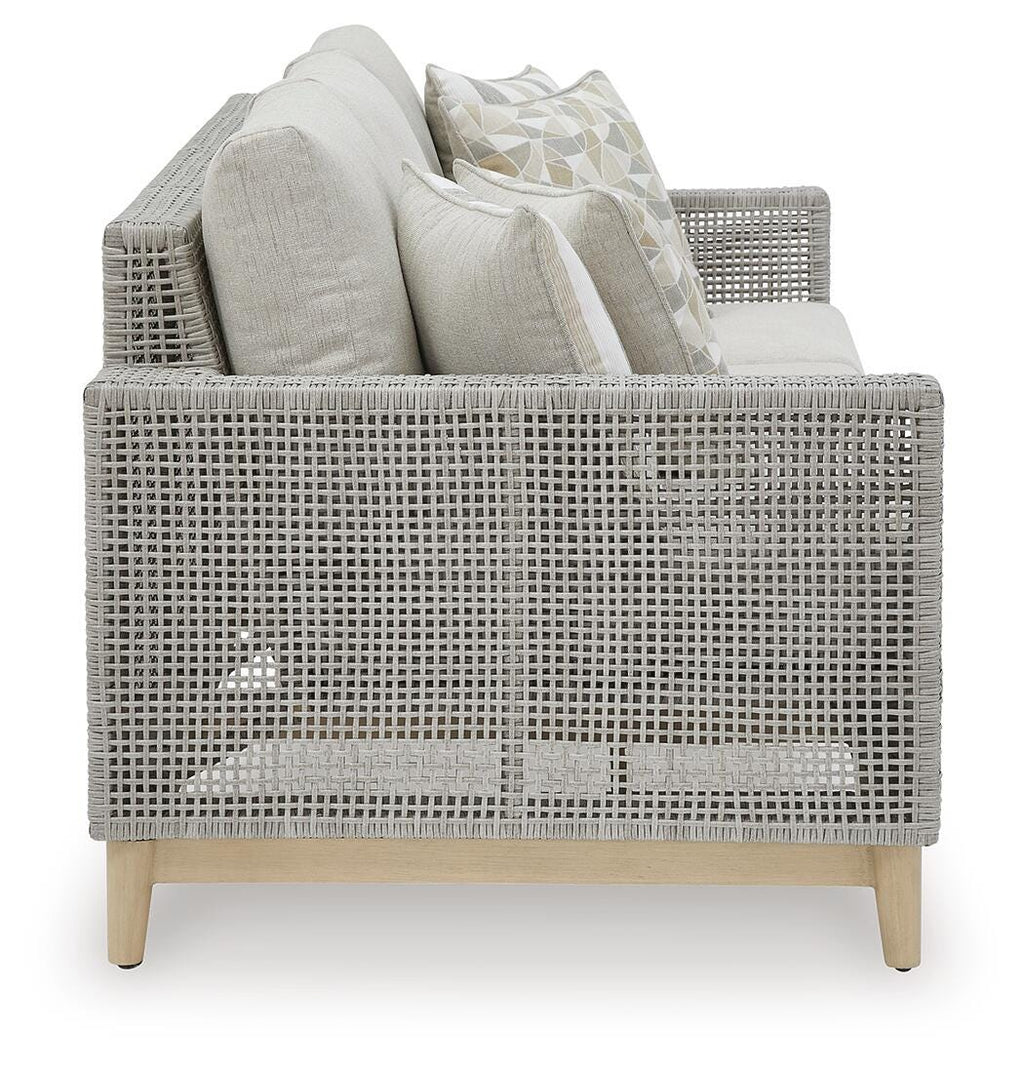 Seton Creek Outdoor Sofa with Cushion in Gray, side view